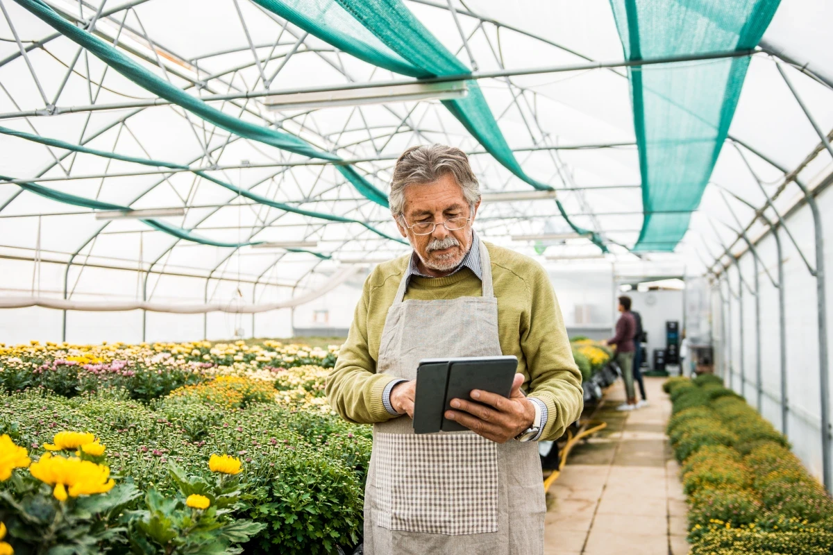 Man using device in poly tunnel small
